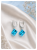 modne kolczyki z krysztalami, kolczyki rodowane kostki, blekitne kolczyki swarovski, eleganckie kolczyki angielskie, kolczyki premium shoper