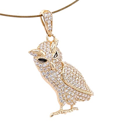 biżuteria symbolizująca mądrość, elegancka zawieszka na specjalne okazje, biżuteria z charakterem złoto, złoty dodatek do stylizacji wieczorowej, prestiżowa zawieszka z kamieniami