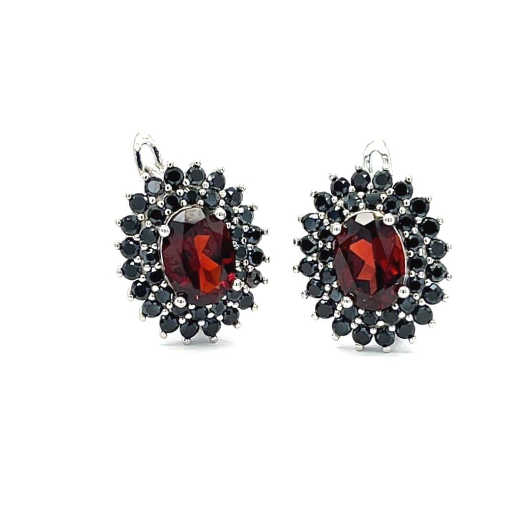 kolczyki srebrne rodowane z kamieniami, biżuteria z granatem 5x7 mm, czarny spinel kolczyki srebrne, kolczyki z podwójną aureolą kamieni, sklep jubilerski online 2026, kolczyki z naturalnym czerwonym kamieniem