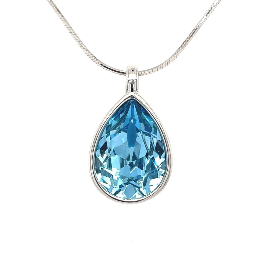 Srebrna rodowana zawieszka 925 z błękitnym kryształem Swarovski® w kształcie kropli.