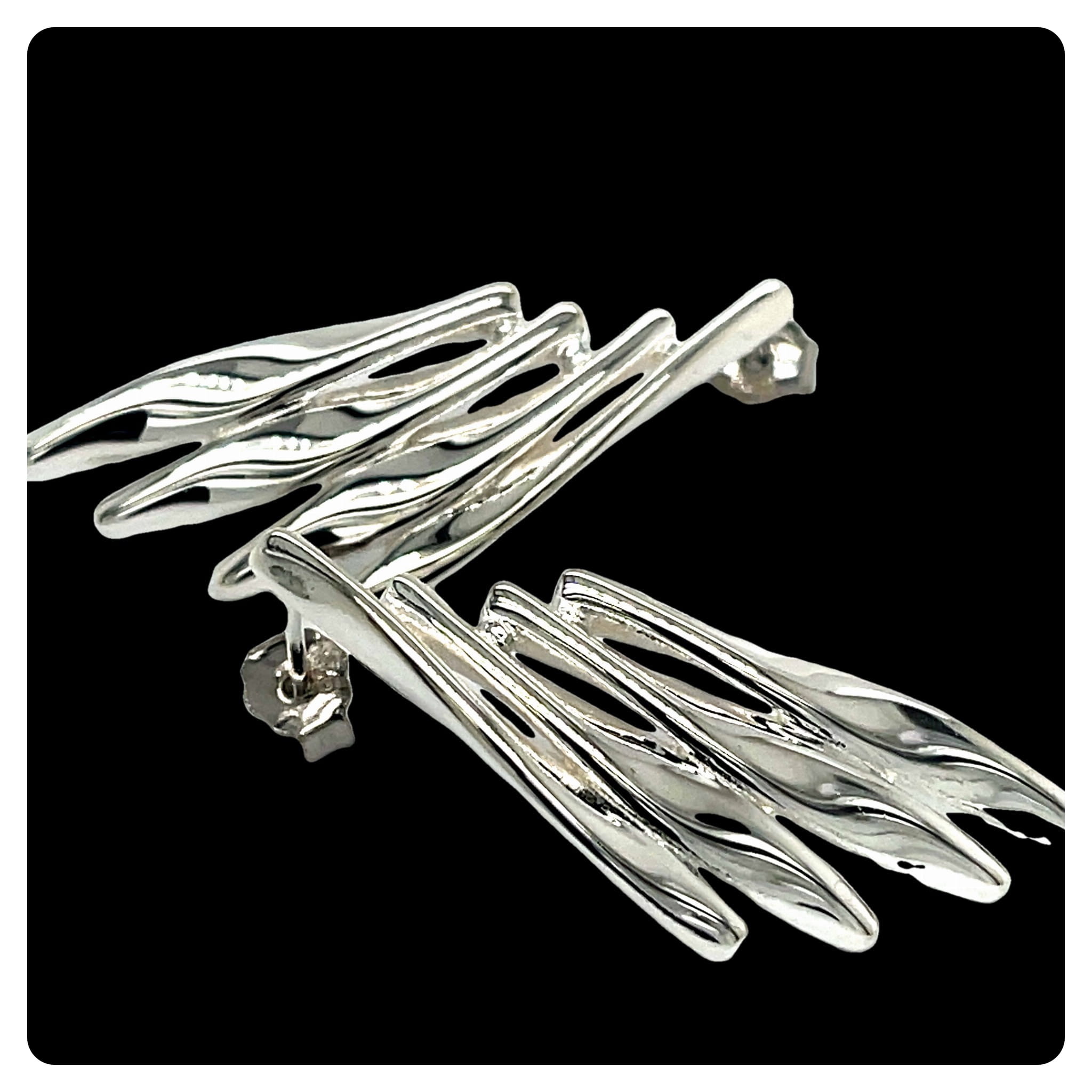 Kolczyki na sztyfcie , srebro rodowane pr. 925 Srebrne fale