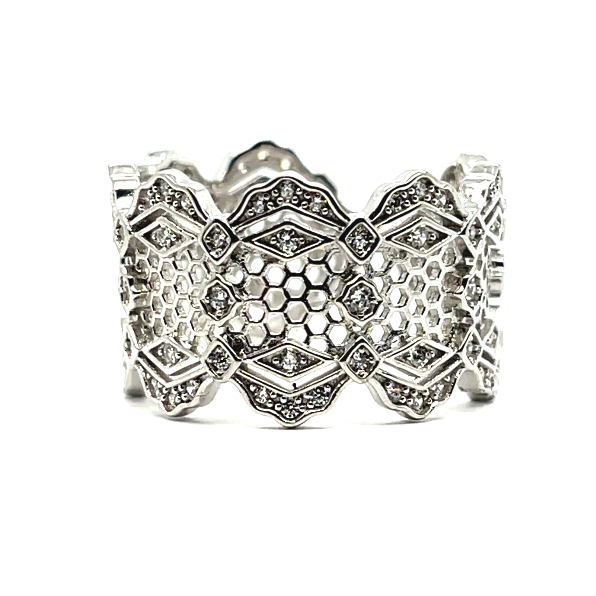 Srebrny pierścionek z orientalnym designem, ażur i cyrkonie